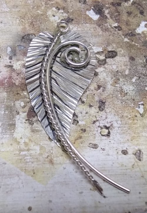 Judy Larson's Bali Style Earrings - , Contemporary Wire Jewelry, Stamping, Stamps, Butane Torch, Soldering, Solder, Drilling, Drill, Place the leaf on a soldering surface.
